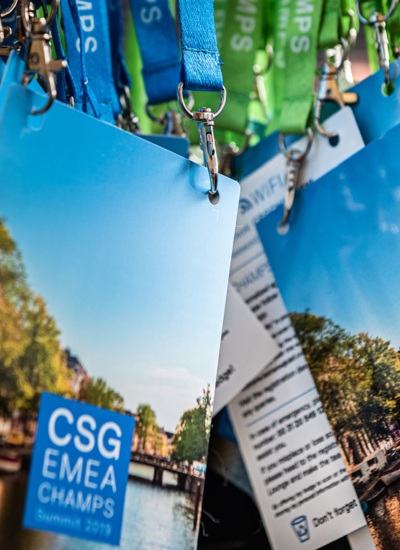 A collection of delegate badges with CSG EMEA Champs Summit 2019