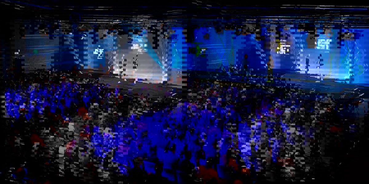 Audience at Medidata NEXT event watching presenters on stage