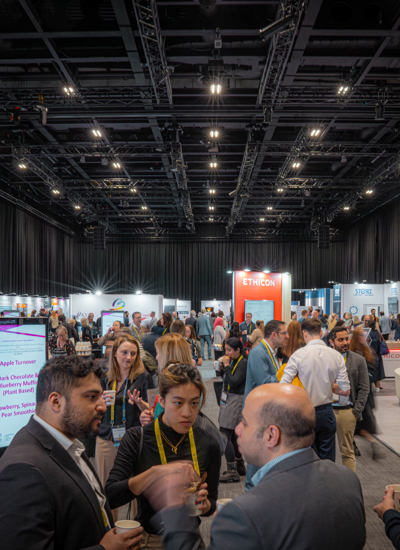 Expedition Hall at an association event with people engaged in conversation