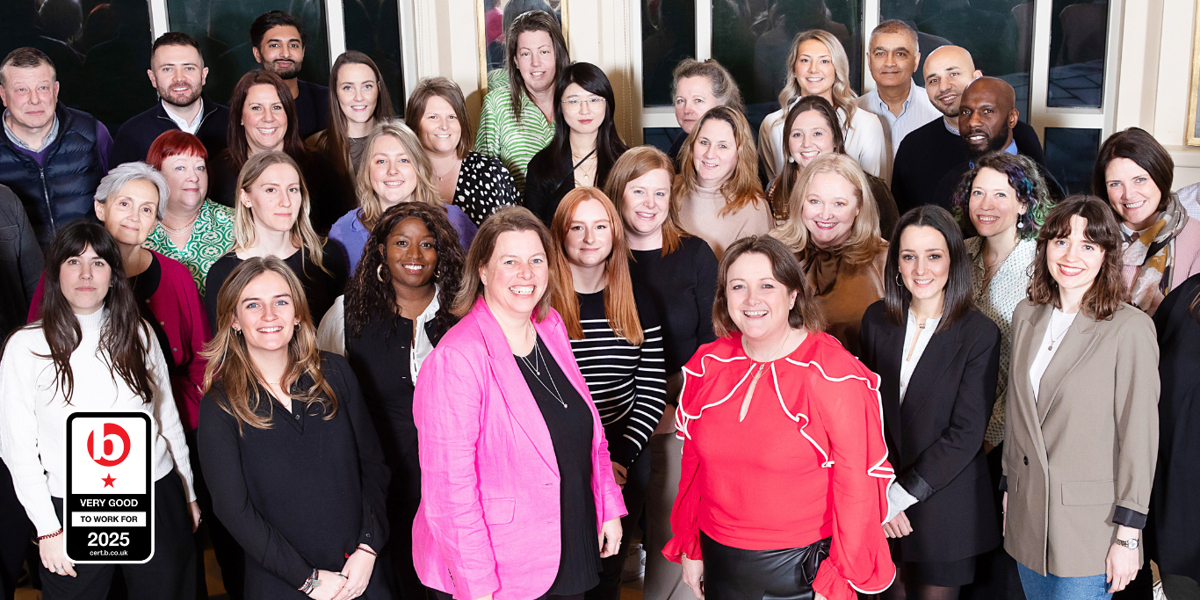 The Outsourced Events Team in a group shot at the 2025 retreat. The Best Companies logo is displayed