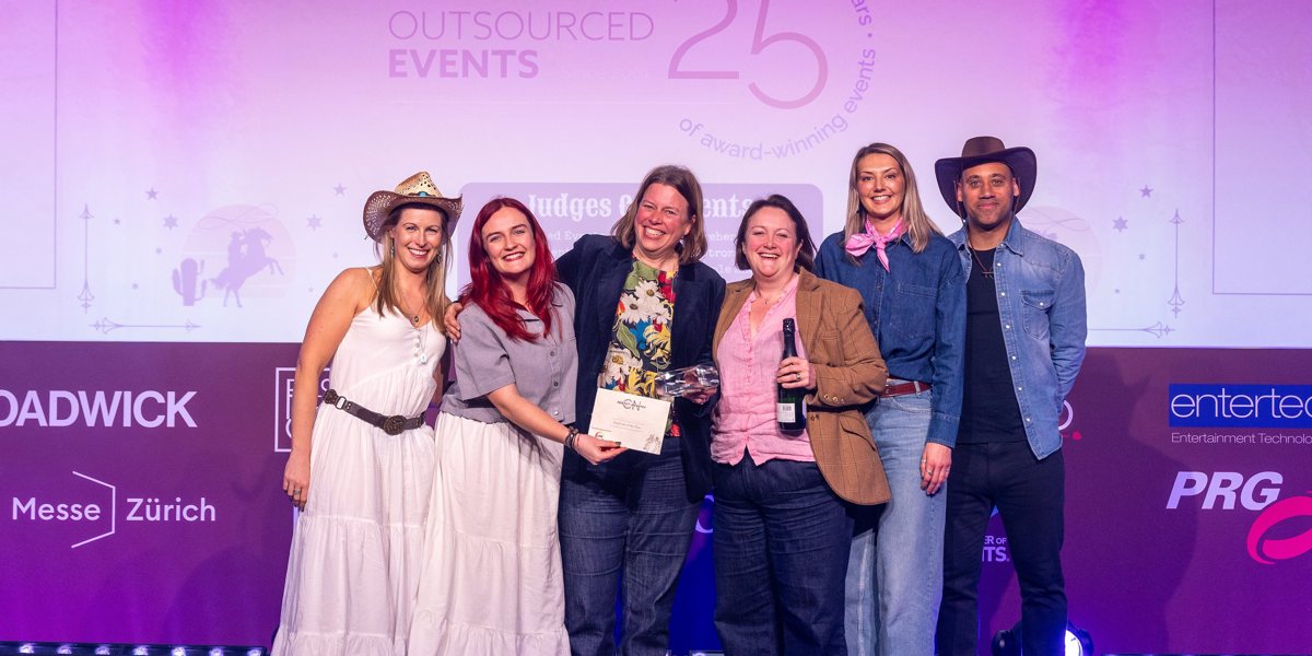 Outsourced Events team collecting award after win at CN Agency Awards 2026