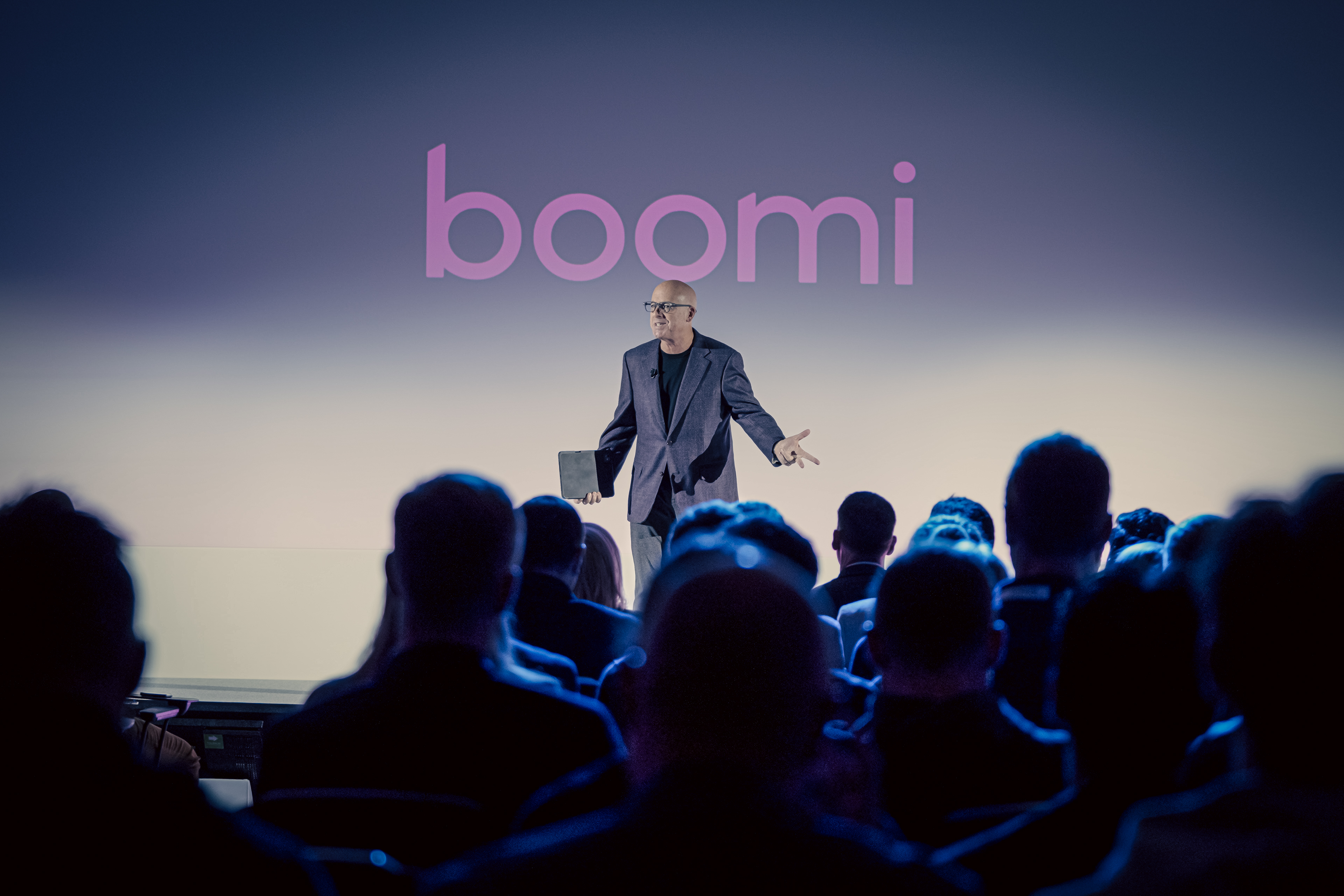 Speaker engaging the audience on stage at the Boomi Event London 2025