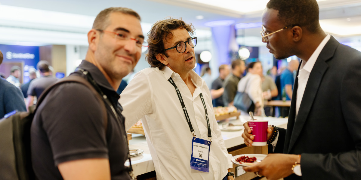 Delegates networking and connecting at a corporate event