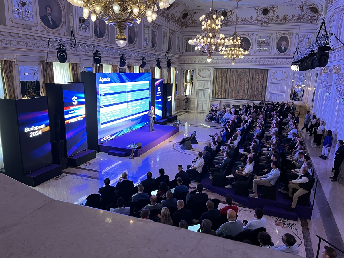 Audience at the Sentinel One Budapest conference watching the speaker on the stage presenting