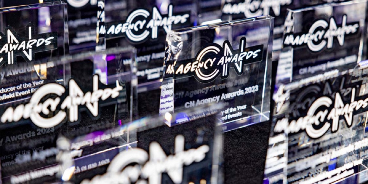 CN Agency Awards glass trophies standing upright on display.